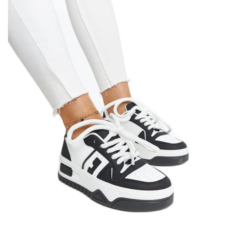 Black and white Galit sneakers with a thick sole