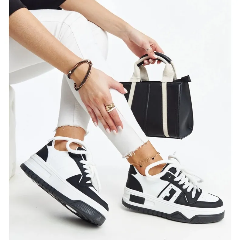 Black and white Galit sneakers with a thick sole